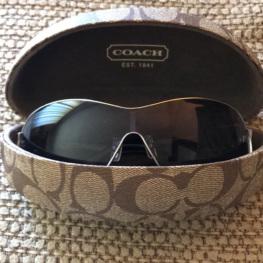 Authentic black Coach aviator sunglasses.